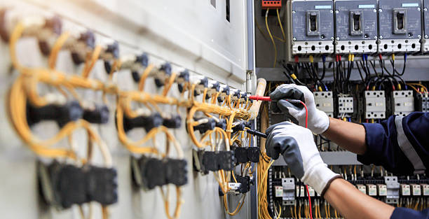 Professional Electrician technician working in Spencerville, MD